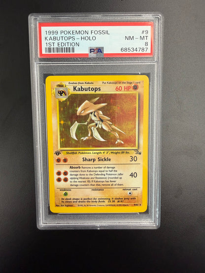 1999 POKEMON FOSSIL KABUTOPS-HOLO 1ST EDITION #9 PSA 8